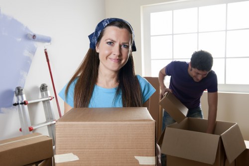 A professional office relocation team organising transport for a Notting Hill business move