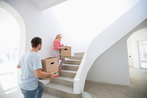 Business furniture and office items ready for relocation in a Notting Hill commercial space