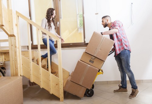 Careful packing of fragile household items in Notting Hill