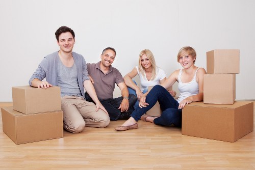 Local movers loading furniture for a short-distance Notting Hill relocation